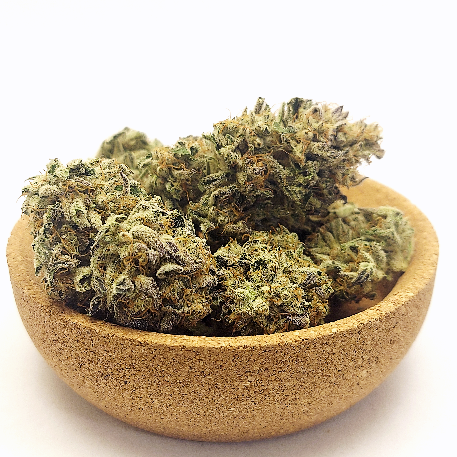 A closeup photo of cannabis buds of the strain Kush Cake, grown by Lukas Greene. Photo credit: Lukas Greene